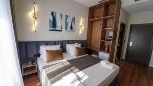 Voodi või voodid majutusasutuse Vion Sea Boutique Hotel - Golem Durrës toas