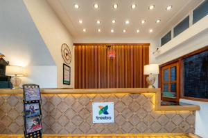 Un certificado, premio, letrero u otro documento en Treebo Premium Bridge View Regency, Mall Road