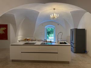 Kuchyň nebo kuchyňský kout v ubytování Suite Garden- Palazzo Villani Lubelli