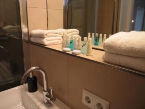 Ένα μπάνιο στο Long-Island-Suite-direkt-am-Meer
