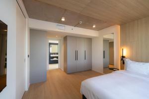 Voodi või voodid majutusasutuse NOTO Hotel toas