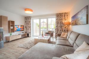 Et tv og/eller underholdning på Feriendorf Robbenplatte Burhave 3