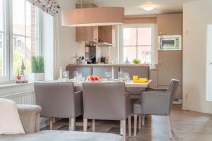 Køkken eller tekøkken på Feriendorf Robbenplatte Burhave 3