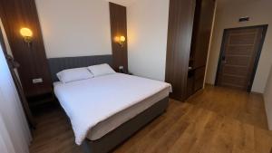 Ліжко або ліжка в номері Hotel Semitronix