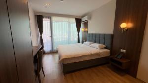 Ліжко або ліжка в номері Hotel Semitronix