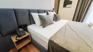 Voodi või voodid majutusasutuse Vion Sea Boutique Hotel - Golem Durrës toas