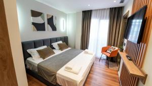 Voodi või voodid majutusasutuse Vion Sea Boutique Hotel - Golem Durrës toas