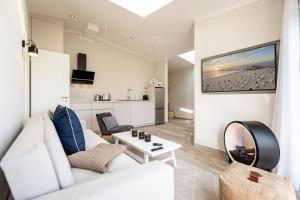 TV a/nebo společenská místnost v ubytování Quartier 7 App 16