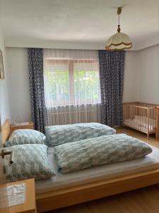 Łóżko lub łóżka w pokoju w obiekcie Ferienwohnung Christ
