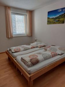 Posteľ alebo postele v izbe v ubytovaní Ferienwohnung Haus Annabelle Top 3