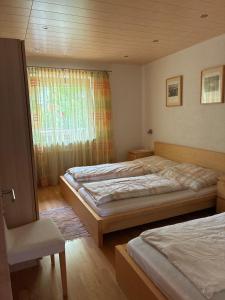 Łóżko lub łóżka w pokoju w obiekcie Ferienwohnung Christ