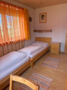 Łóżko lub łóżka w pokoju w obiekcie Ferienwohnung Christ