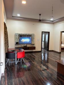 TV/trung tâm giải trí tại The Aura Poolside