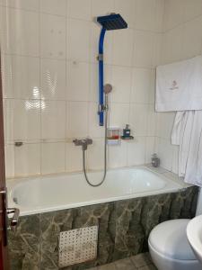 Vannituba majutusasutuses Prodiges Hôtel