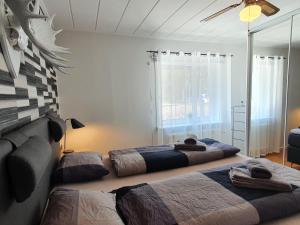 Ένα ή περισσότερα κρεβάτια σε δωμάτιο στο Villa Norrland