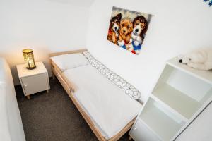 Ein Bett oder Betten in einem Zimmer der Unterkunft Ferienwohnung Sellin 35