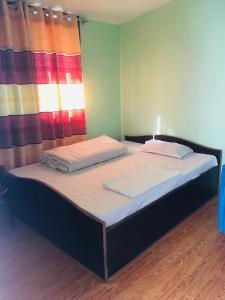 Postel nebo postele na pokoji v ubytování Local point homestay