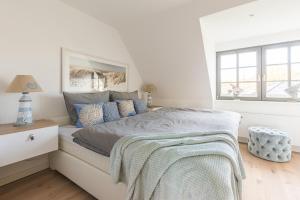 Ένα ή περισσότερα κρεβάτια σε δωμάτιο στο Ozeanblau