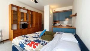 Kuchyň nebo kuchyňský kout v ubytování Raffaello Apartment - Affitti Brevi italia