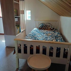 Ένα ή περισσότερα κρεβάτια σε δωμάτιο στο Chalet Little Zion au Domaine de Baradoz