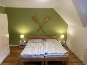 Postel nebo postele na pokoji v ubytování Hafenhaus Anglerdomizil