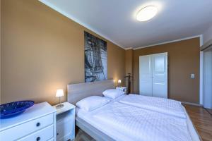 Postel nebo postele na pokoji v ubytování Hafenhaus Anglerdomizil + 10 fotografií