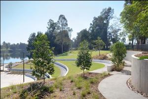a park with a golf course and a lake at 2 Bedroom Near Nepean Hospital & Penrith in Kingswood +16 photos