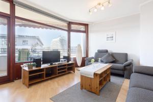 Televiisor ja/või meelelahutuskeskus majutusasutuses Grömitz-Center Whg 651