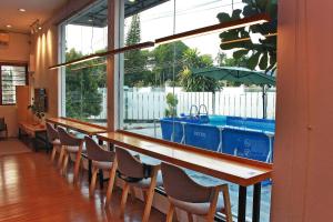 Πισίνα στο ή κοντά στο The Nook Holiday Home Cozy, Stylish, Swimming Pool