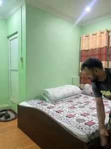 Postel nebo postele na pokoji v ubytování Local point homestay