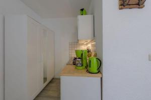 Kuchyň nebo kuchyňský kout v ubytování Hafenhaus Unterwasserwelt