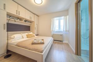 A bed or beds in a room at Villa Alea Hvar