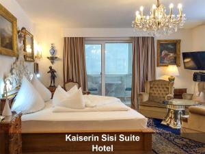 Schloss Hotel Fernsteinsee客房内的一张或多张床位