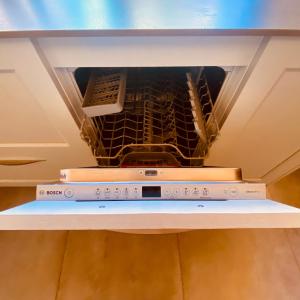 an oven with two pizzas inside of it at La Bodega de la Valduerna 2 in Destriana +19 photos