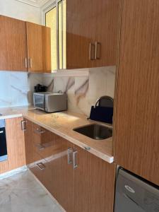 Η κουζίνα ή μικρή κουζίνα στο Manami Appartementen AlHoceima