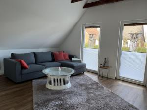 Χώρος καθιστικού στο Ferienwohnung Hafennah