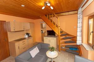 Kuchyň nebo kuchyňský kout v ubytování Ferienwohnungen unter Reet 45106