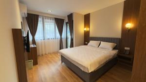 Ліжко або ліжка в номері Hotel Semitronix