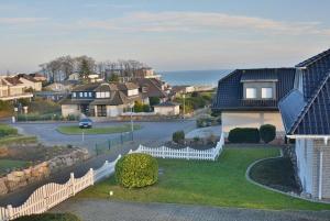 an aerial view of a residential neighborhood with houses at Hafenblick Whg 15 in Grömitz