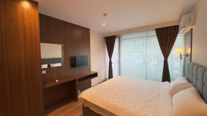 Ліжко або ліжка в номері Hotel Semitronix
