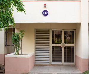 an entrance to a building with a sign on it at Suit 360 Abuja in Abuja