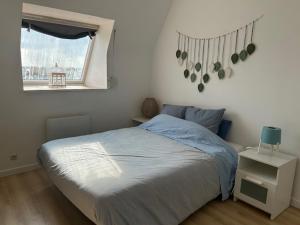 Katil atau katil-katil dalam bilik di T2 plage de Caroual vue mer