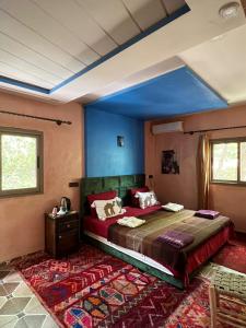 Letto o letti in una camera di Riad Atlas Garden