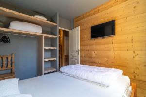Postel nebo postele na pokoji v ubytování Appartement cosy tout confort + 6 fotografií