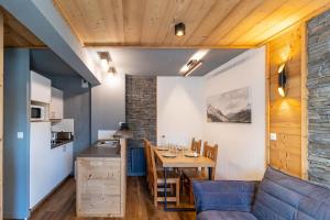 Kuchyň nebo kuchyňský kout v ubytování Appartement cosy tout confort