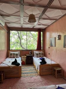 Letto o letti in una camera di Riad Atlas Garden