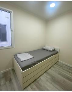 Katil atau katil-katil dalam bilik di Apartamento cerca del mar