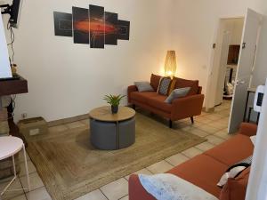 Χώρος καθιστικού στο La Maison du Ruisseau