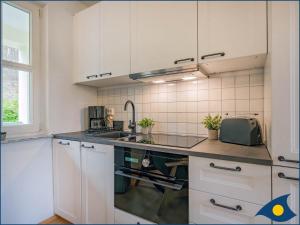 Küche/Küchenzeile in der Unterkunft Villa Margot Whg 26