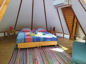 Postel nebo postele na pokoji v ubytování Chalet confortable avec entrée privée à Pointe-Noire